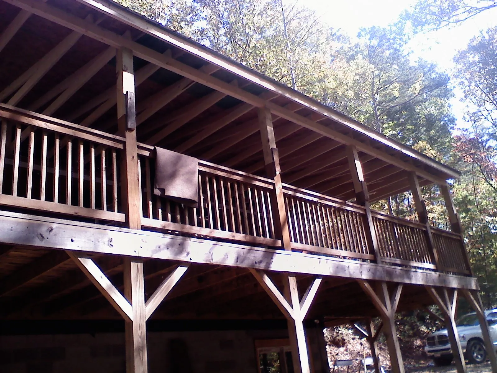 Timber framing under a new elevated porch and deck — Roof Leak Repair in Horace by Roofing Brothers